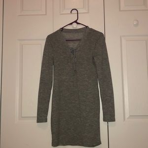 Grey dress with long sleeve.
